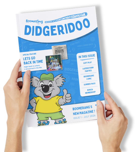 Hands holding The Didgeridoo magazine, issue 1, July 2026